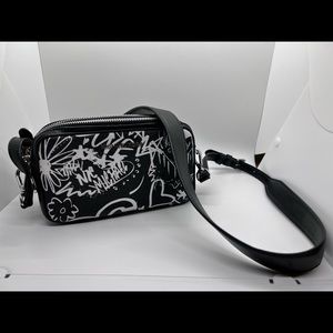 Michael Kors Graffiti crossbody bag. Never been used.
